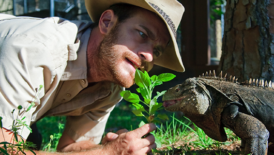 Kenan Harkin with a big Monitor lizard on his back!
