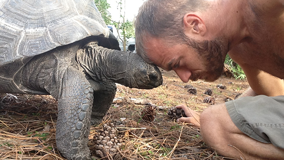 KENAN BONDING WITH 'TITAN', HIS 50YR OLD TORTOISE